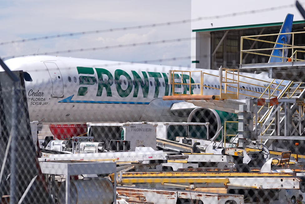 Frontier Airlines Denver runway pedestrian killed May 8 2026 Flight 4345 engine fire evacuation Denver International Airport