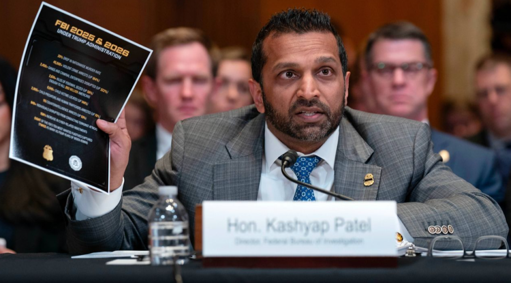 Kash Patel holds up document during tense Senate Appropriations subcommittee hearing