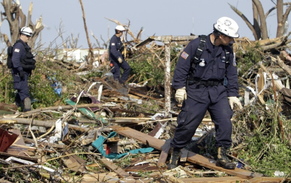 Rescue teams searching through rubble after deadly tornado in Midwest