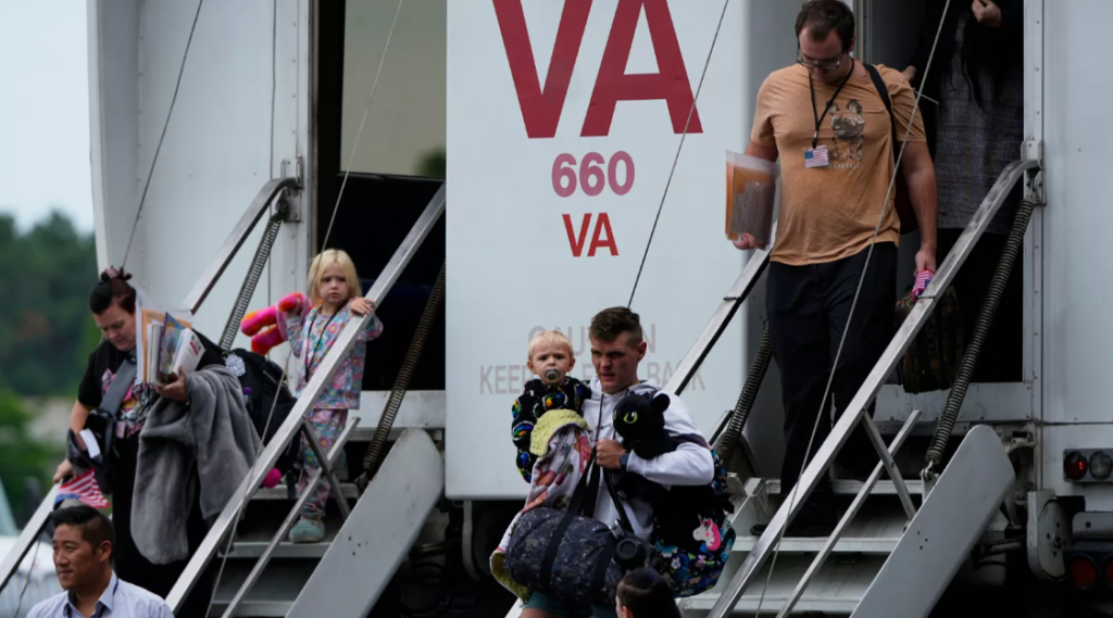 The first group of Afrikaner refugees from South Africa arriving at Washington Dulles International Airport in May 2025 under Trump's refugee resettlement program
