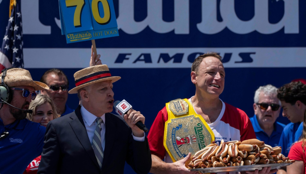 Joey Chestnut Wins His Fourth of July Hot Dog Title in 90-Degree Heat